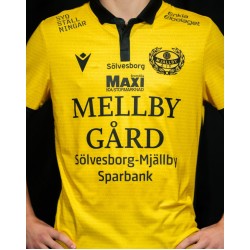 Maglietta Casa Uomo Mjällby AIF 2025 Maglietta Casa Uomo Mjällby AIF 2025
